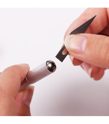 Cutter avec lames de rechange